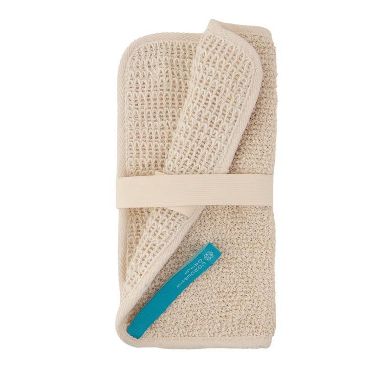 A beige textured bath sponge wrapped with a matching elastic band and a turquoise paper tag, shown on a plain white background.