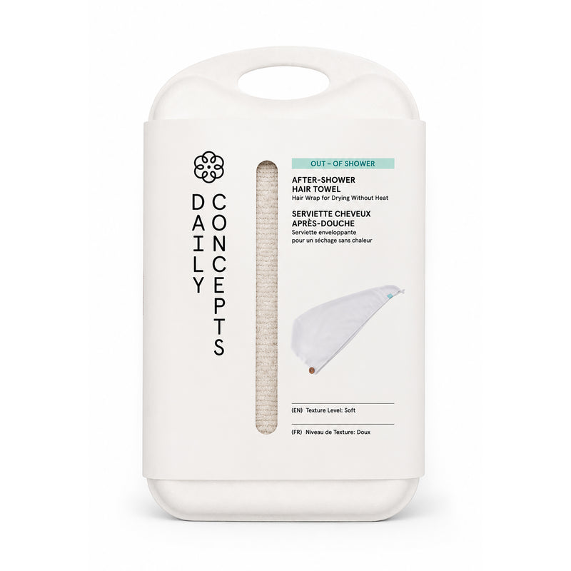 After-shower hair towel with walnut button fastening, shown with its sugarcane pulp packaging.