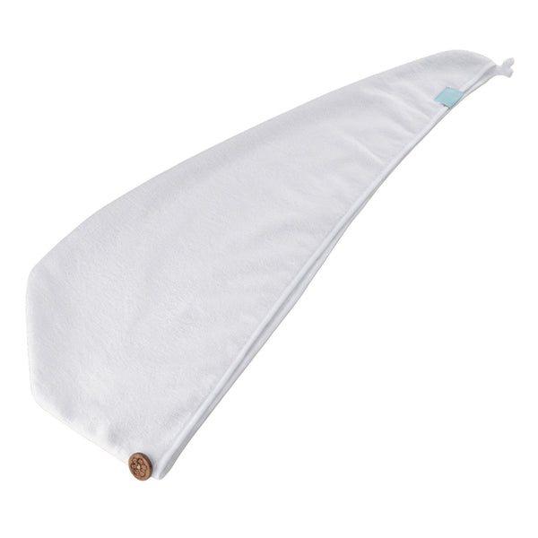 After-shower hair towel with walnut button fastening.
